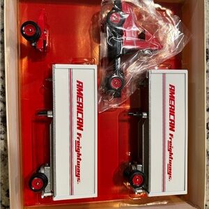 Red and White Toy Truck Set
